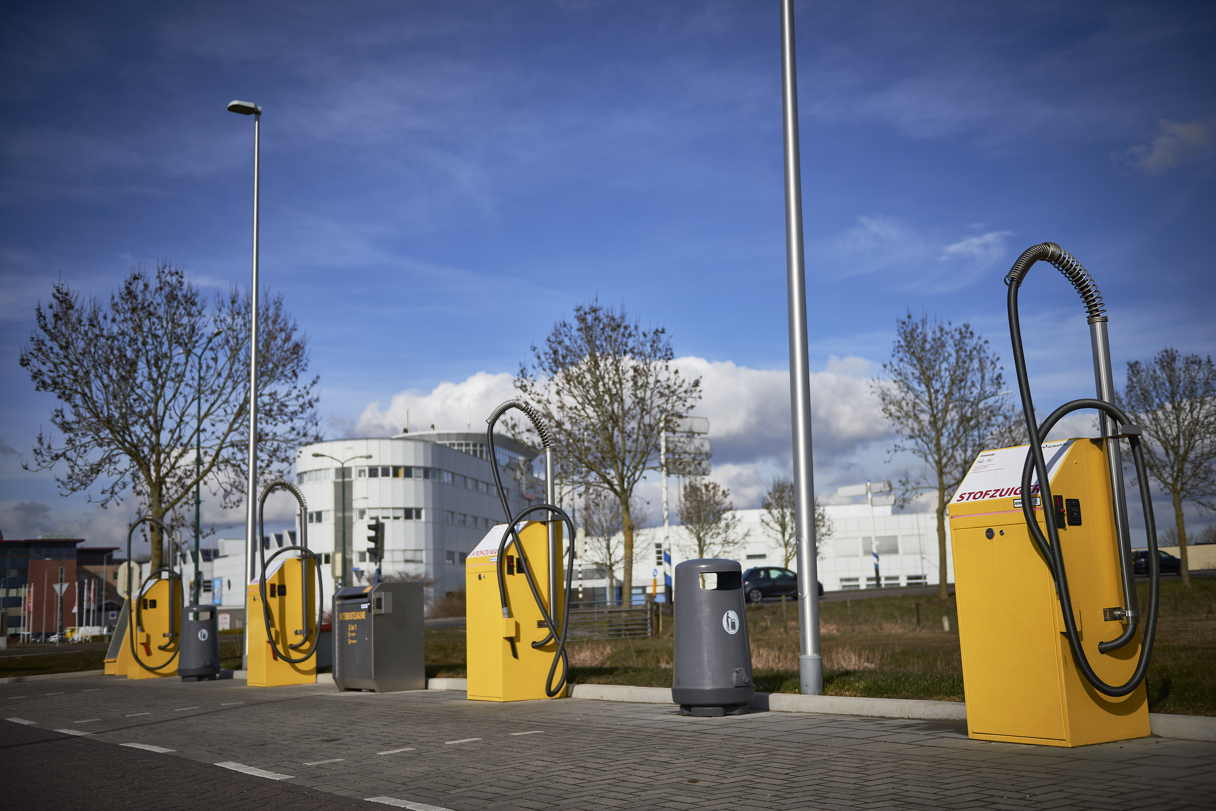Fleet of unattended vacuum machines deployed across an outdoor service site